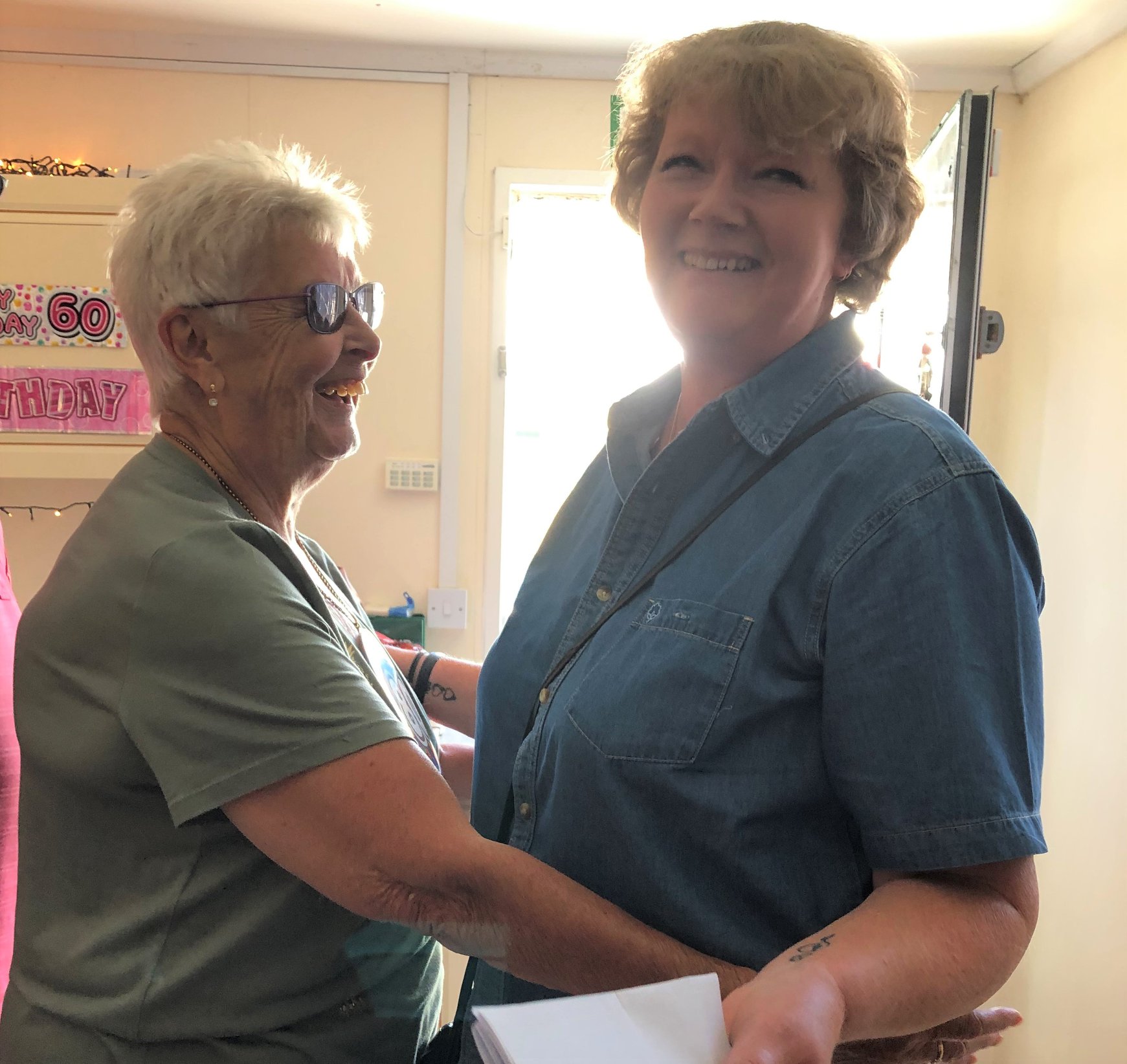 Volunteer helping seniors